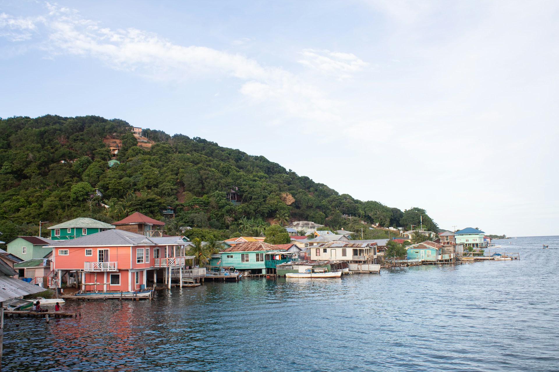 Image showing colorful houses on stilts near the water's edge